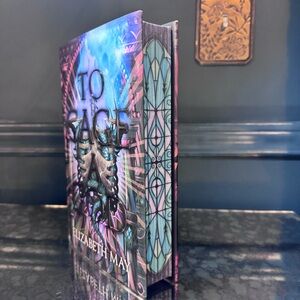 Illumicrate To Cage A God by Elizabeth May